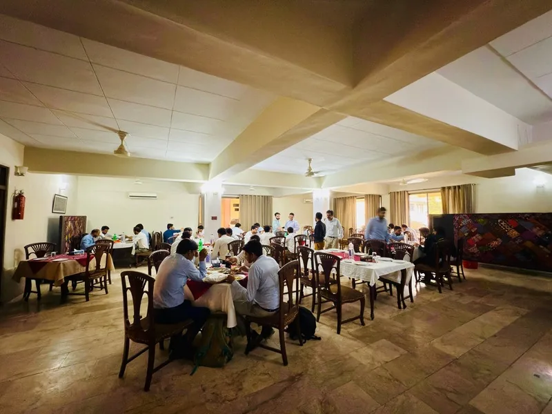 Dining hall of Pameer Hotel restaurant in Mingora with guests at tables
